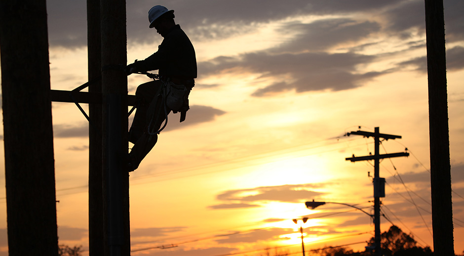 Lineman on pole