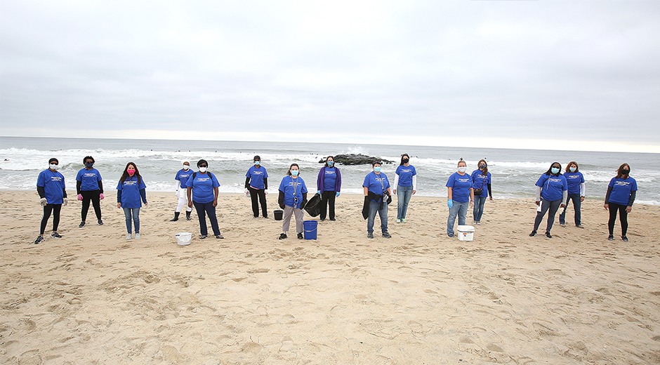 JCP&L employees sweeping beach
