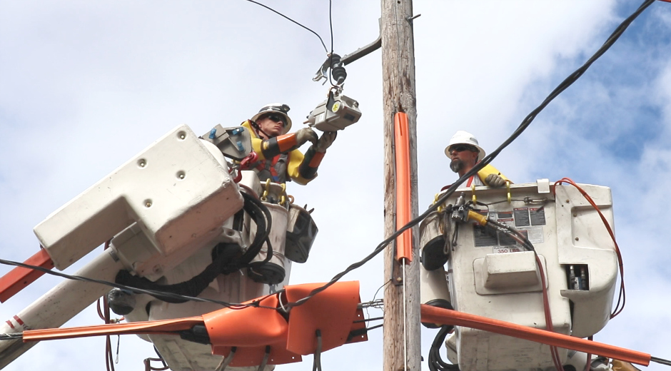 Lineman installing Upgrades