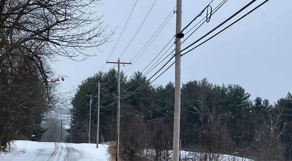 Power lines on a snowy road