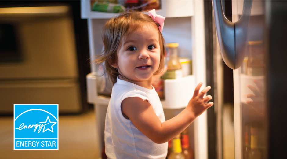 child standing at refrigerator and EE logo