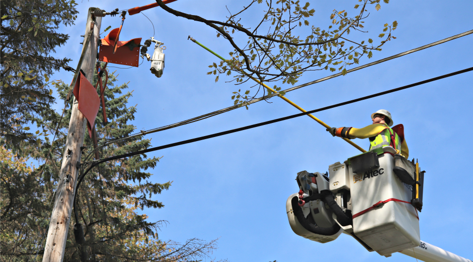 Lineman installing TripSaver