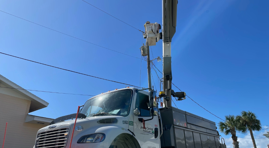 Line worker bucket truck image