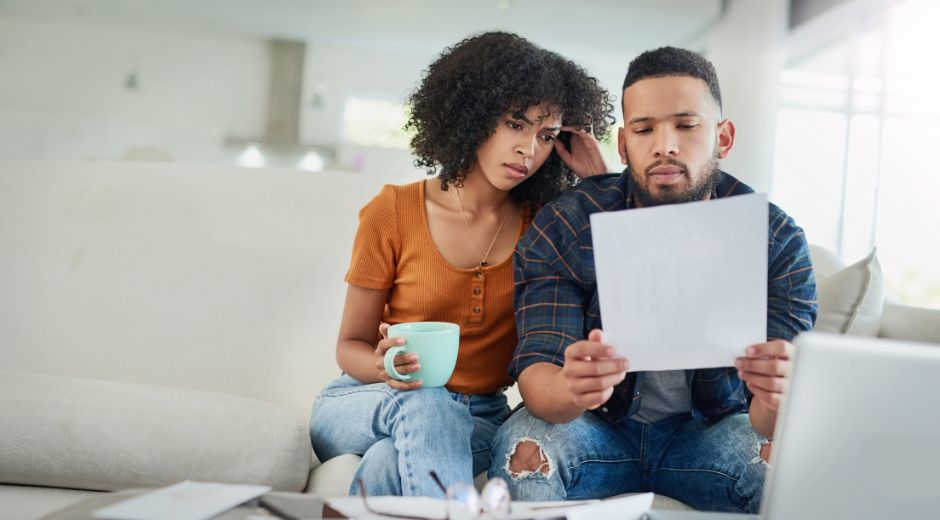 Couple looking at their bill